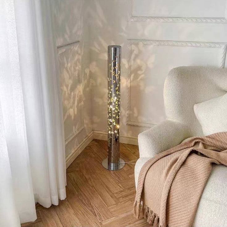 Contemporary Scandinavian Cylinder Disc Base Butterfly Textured Stainless Steel LED Floor Lamp for Living Room 

Elevate your living space with this stylish standing floor lamp, featuring a sleek cylinder design and butterfly texture. Crafted from durable