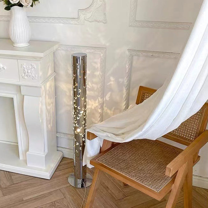 Contemporary Scandinavian Cylinder Disc Base Butterfly Textured Stainless Steel LED Floor Lamp for Living Room 

Elevate your living space with this stylish standing floor lamp, featuring a sleek cylinder design and butterfly texture. Crafted from durable