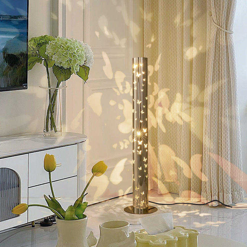 Contemporary Scandinavian Cylinder Disc Base Butterfly Textured Stainless Steel LED Floor Lamp for Living Room 

Elevate your living space with this stylish standing floor lamp, featuring a sleek cylinder design and butterfly texture. Crafted from durable