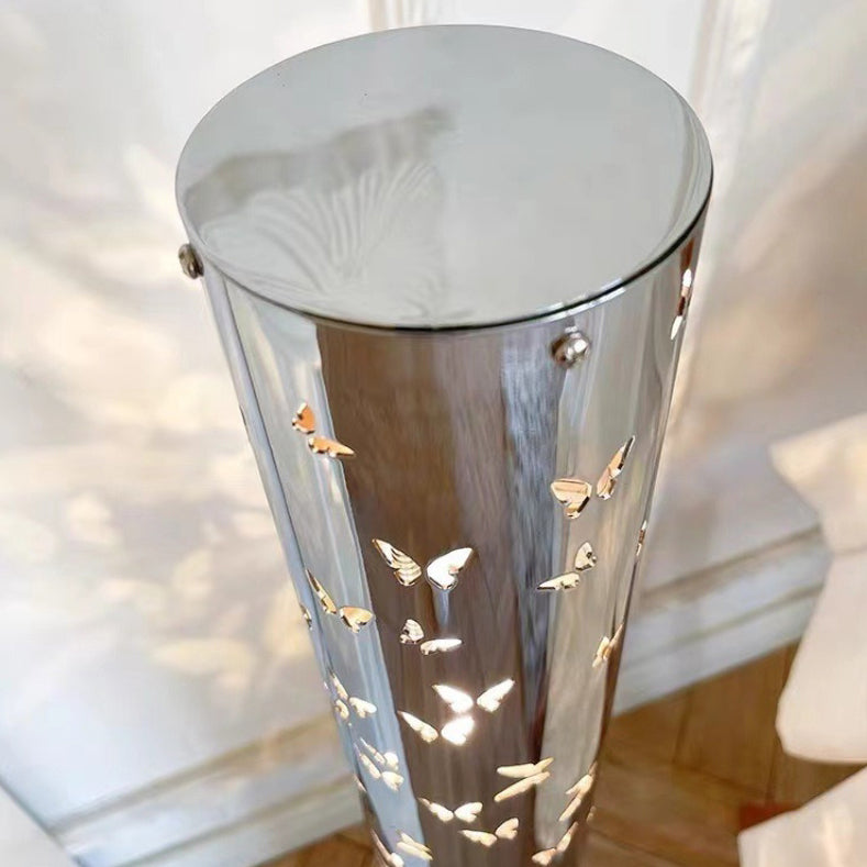Contemporary Scandinavian Cylinder Disc Base Butterfly Textured Stainless Steel LED Floor Lamp for Living Room 

Elevate your living space with this stylish standing floor lamp, featuring a sleek cylinder design and butterfly texture. Crafted from durable