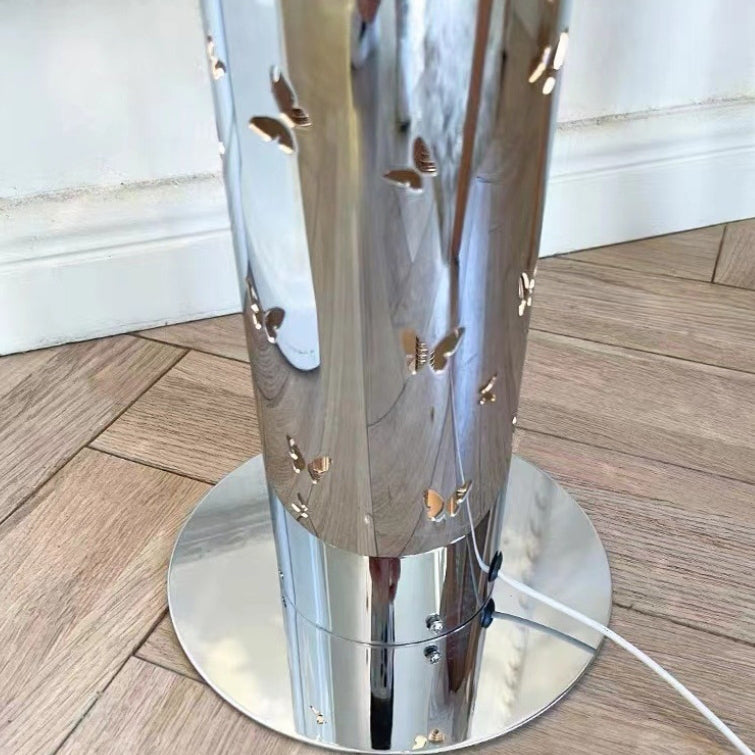 Contemporary Scandinavian Cylinder Disc Base Butterfly Textured Stainless Steel LED Floor Lamp for Living Room 

Elevate your living space with this stylish standing floor lamp, featuring a sleek cylinder design and butterfly texture. Crafted from durable