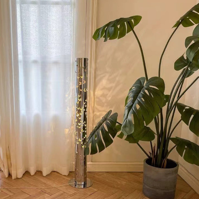 Contemporary Scandinavian Cylinder Disc Base Butterfly Textured Stainless Steel LED Floor Lamp for Living Room 

Elevate your living space with this stylish standing floor lamp, featuring a sleek cylinder design and butterfly texture. Crafted from durable