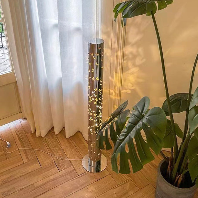 Contemporary Scandinavian Cylinder Disc Base Butterfly Textured Stainless Steel LED Floor Lamp for Living Room 

Elevate your living space with this stylish standing floor lamp, featuring a sleek cylinder design and butterfly texture. Crafted from durable