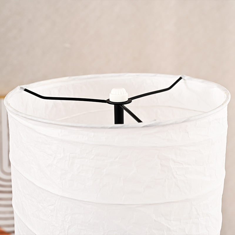Traditional Japanese Pleated Paper Floor Lamp - 1-Light Column Shade for Home Office

Illuminate your workspace with this elegant Traditional Japanese Pleated Paper Column Shade Floor Lamp. Perfect for adding a serene ambiance to your home office, this 1-