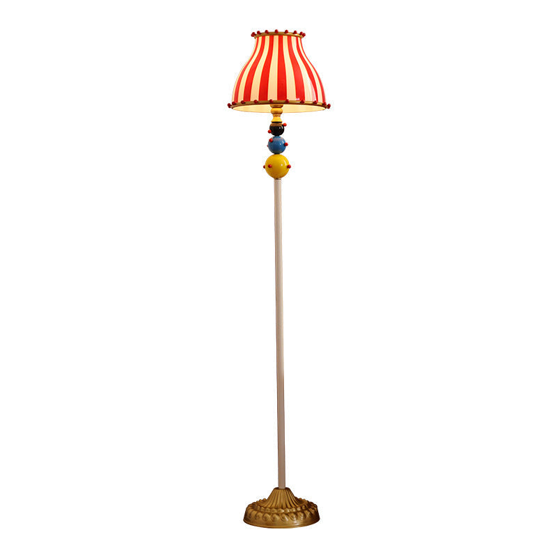 Contemporary Circus Red & White Striped Glass Round Shade Floor Lamp - 1-Light Iron Design for Bedroom  

Illuminate your bedroom with this stylish contemporary floor lamp featuring a unique circus-inspired design. The vibrant red and white striped glass