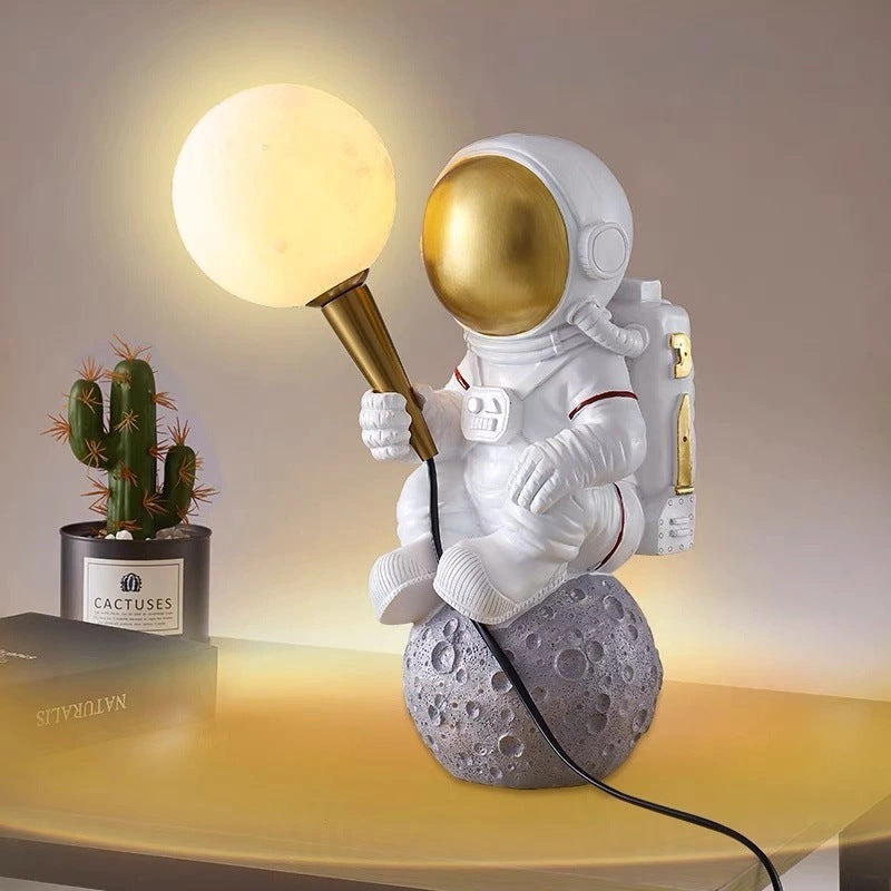 Creative Kids Table Lamp - 1-Light Cartoon Astronaut Resin Lamp for Bedroom, Space-Themed Night Light, Fun Bedroom Decor for Children, Cute Astronaut Design, Ideal Gift for Kids, Bedroom Lighting, Kids Room Accessories, Nursery Lamp, Playful Table Lamp fo