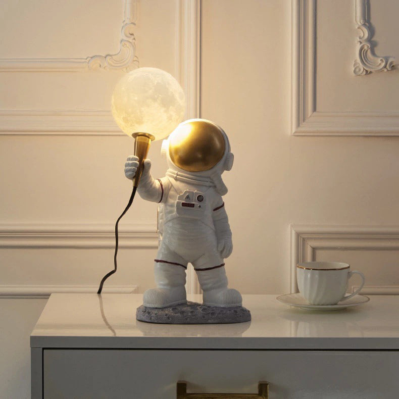 Creative Kids Table Lamp - 1-Light Cartoon Astronaut Resin Lamp for Bedroom, Space-Themed Night Light, Fun Bedroom Decor for Children, Cute Astronaut Design, Ideal Gift for Kids, Bedroom Lighting, Kids Room Accessories, Nursery Lamp, Playful Table Lamp fo