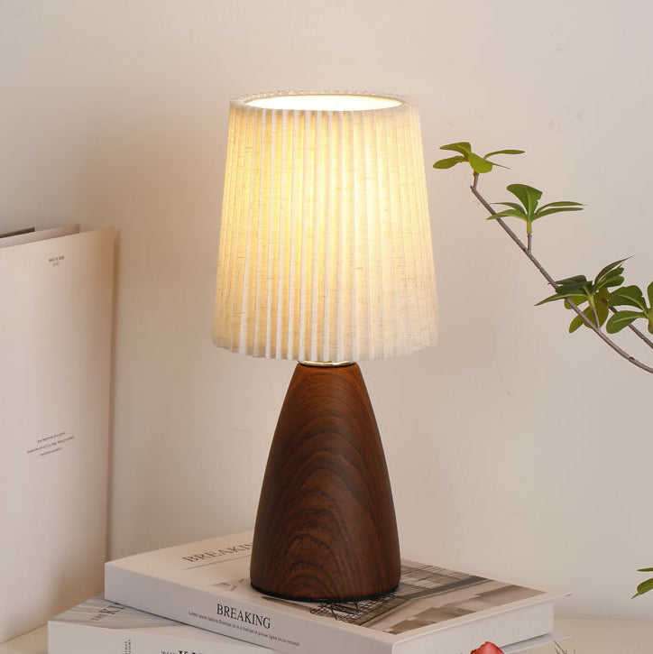 Modern Minimalist Cylinder Conical Fabric Ceramic 1-Light Table Lamp for Bedroom, Stylish Bedside Lamp, Contemporary Lighting, Home Decor, Warm White Lighting, Modern Nightstand Lamp, Ceramic Base, Minimalist Design, Unique Bedroom Light, Cozy Atmosphere,