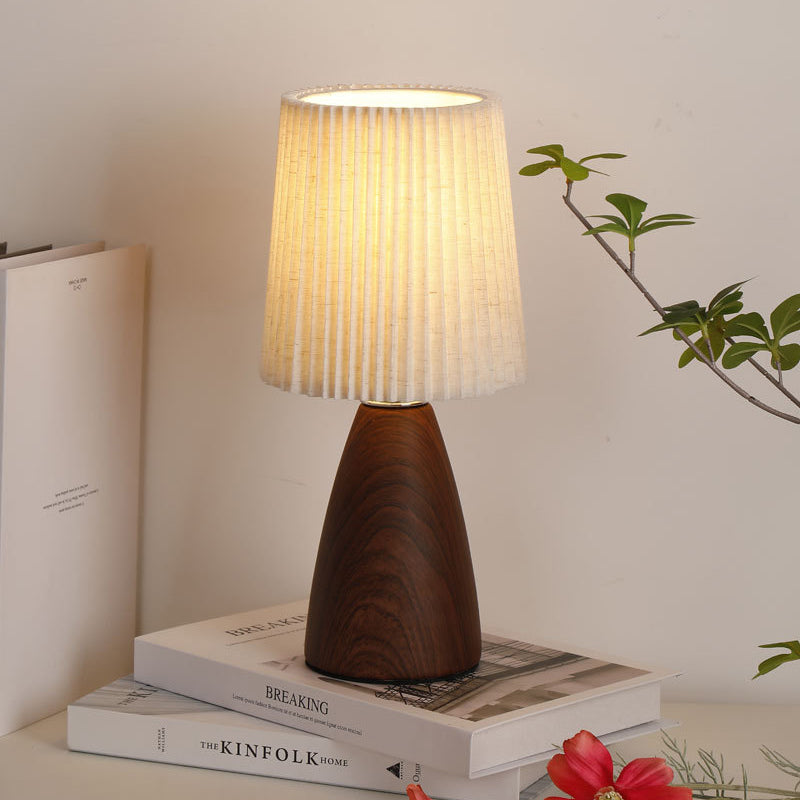 Modern Minimalist Cylinder Conical Fabric Ceramic 1-Light Table Lamp for Bedroom, Stylish Bedside Lamp, Contemporary Lighting, Home Decor, Warm White Lighting, Modern Nightstand Lamp, Ceramic Base, Minimalist Design, Unique Bedroom Light, Cozy Atmosphere,