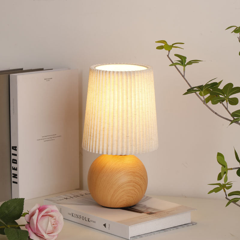 Modern Minimalist Cylinder Conical Fabric Ceramic 1-Light Table Lamp for Bedroom, Stylish Bedside Lamp, Contemporary Lighting, Home Decor, Warm White Lighting, Modern Nightstand Lamp, Ceramic Base, Minimalist Design, Unique Bedroom Light, Cozy Atmosphere,