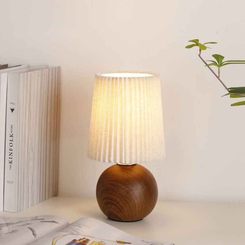 Modern Minimalist Cylinder Conical Fabric Ceramic 1-Light Table Lamp for Bedroom, Stylish Bedside Lamp, Contemporary Lighting, Home Decor, Warm White Lighting, Modern Nightstand Lamp, Ceramic Base, Minimalist Design, Unique Bedroom Light, Cozy Atmosphere,