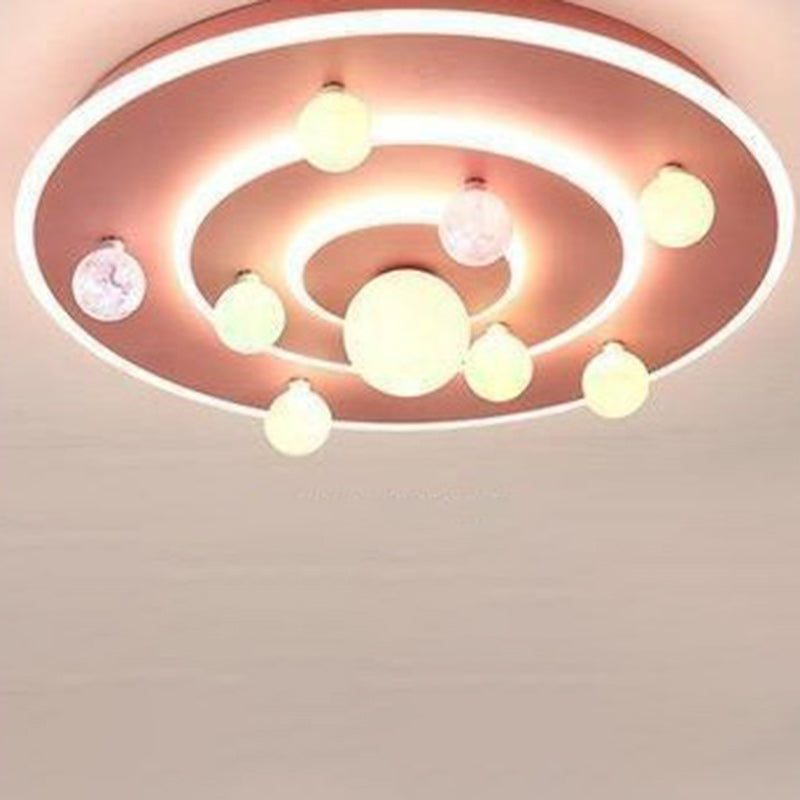 Contemporary Planet Iron LED Ceiling Light for Kids' Room

This stylish and modern flush mount ceiling light features a contemporary round design inspired by space planets. Perfect for children's bedrooms, nurseries, or playrooms, this whimsical fixture a