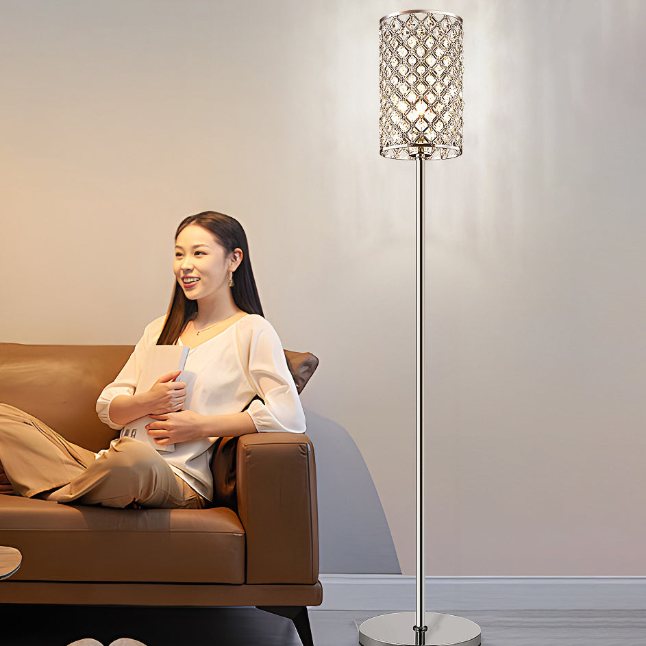 Modern Luxury Iron Crystal Cylinder Floor Lamp for Living Room  

Elevate your living space with this Modern Luxury Iron Crystal Cylinder Floor Lamp. Designed to enhance any decor, this elegant standing floor lamp features a stunning crystal cylinder and