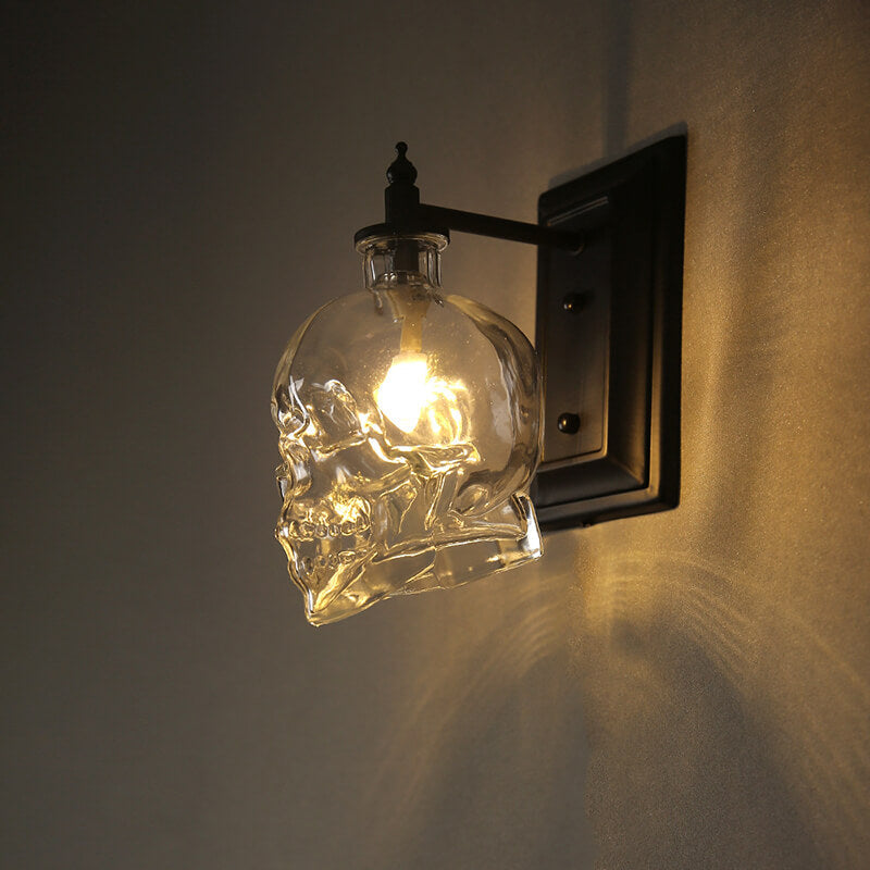 Contemporary Skull Glass Iron Wall Sconce - 1-Light Halloween Lamp for Living Room
