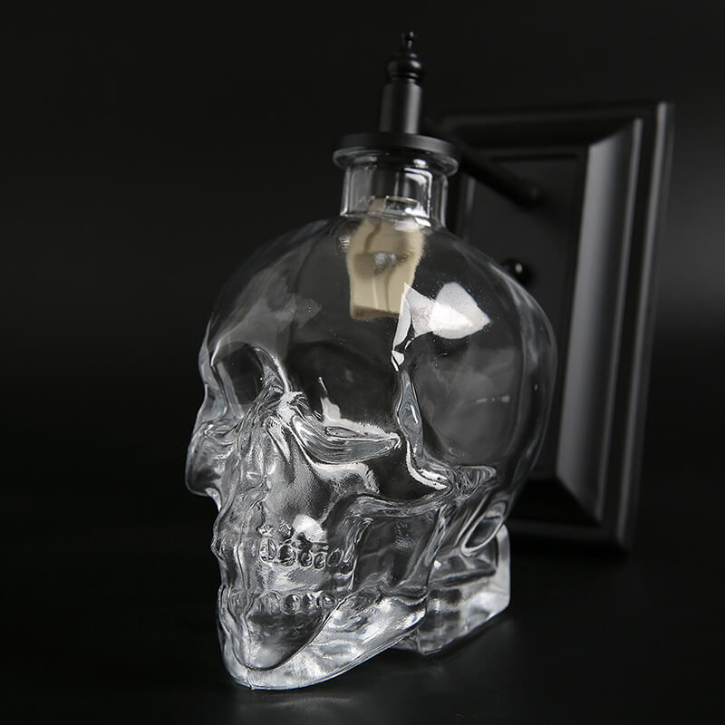 Contemporary Skull Glass Iron Wall Sconce - 1-Light Halloween Lamp for Living Room