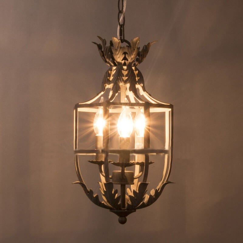 Vintage Wrought Iron Lantern Cage 3-Light Chandelier  

Illuminate your space with this elegant vintage wrought iron chandelier. Featuring a stunning lantern cage design, this 3-light fixture blends classic charm with modern functionality. Perfect for din