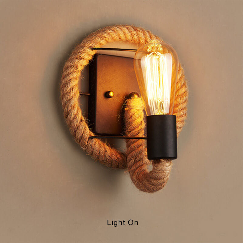 Vintage Hemp Rope Wall Sconce Lamp - 1-Light Design 

Elevate your home decor with this vintage-inspired hemp rope wall sconce lamp. Perfect for adding a rustic touch to any room, this 1-light fixture combines stylish design with practical lighting. Ideal
