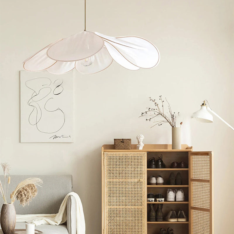 Contemporary Boho Metal Petal Pendant Light for Living Room  

Illuminate your living space with our Contemporary Boho Petal Fabric Metal Lampshade Pendant Light. This stylish 1-light fixture is perfect for adding a touch of bohemian flair to your decor.