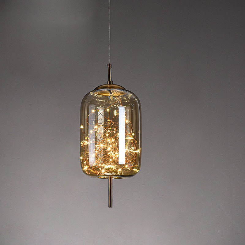 Contemporary Scandinavian Cylinder Oval Glass Pendant Light - 1-Light for Bedroom  

Elevate your bedroom decor with this stylish contemporary Scandinavian cylinder oval glass pendant light. Its sleek design and soft illumination create a cozy atmosphere,