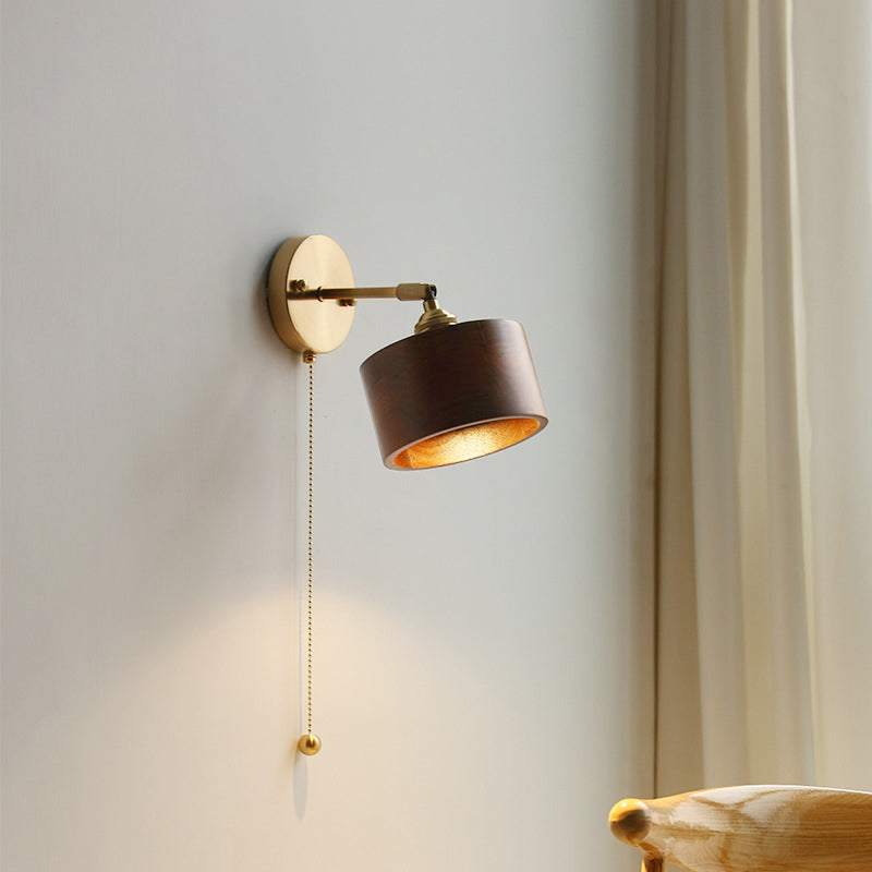 Contemporary Scandinavian Copper Wood 1-Light Wall Sconce for Bedroom  

Illuminate your bedroom with this stylish Scandinavian-inspired wall sconce. The unique round cone design combines warm copper and natural wood for a modern touch. This 1-light fixtu