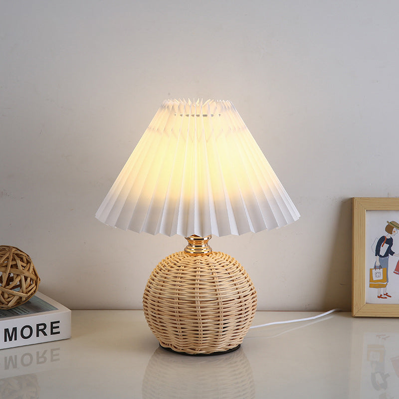 Contemporary Nordic Rattan LED Table Lamp - Pleated Conic Design for Bedroom

Enhance your bedroom décor with this stylish contemporary Nordic rattan fabric pleated conic ball LED table lamp. Featuring a unique pleated design, this lamp combines modern ae