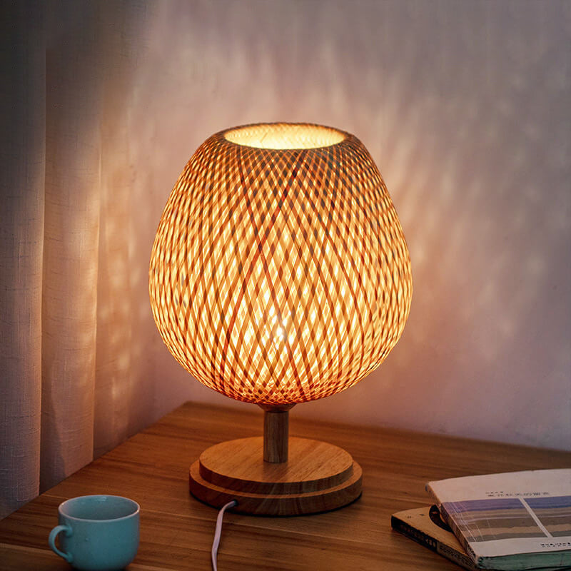Traditional Chinese Moso Bamboo Iron Weaving Oval Table Lamp - 1-Light for Bedroom