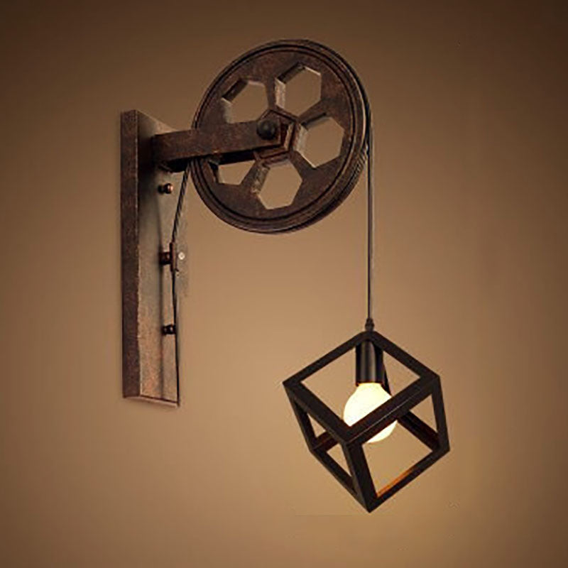 Vintage Industrial Iron Pulley Wall Sconce Lamp - 1-Light Fixture 

Elevate your home decor with this stylish vintage industrial pulley wall sconce. Crafted from durable iron, this 1-light lamp combines rustic charm with modern functionality. Perfect for
