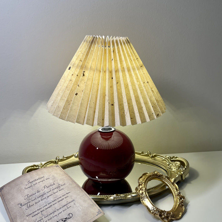 Modern Minimalist Round Fabric Pleated Ceramic 1-Light Table Lamp for Bedroom | Stylish Bedside Lighting | Contemporary Home Decor | Elegant Bedroom Accent | Soft Ambient Illumination | Decorative Lighting Fixture | Chic Fabric Shade | Ceramic Base Design
