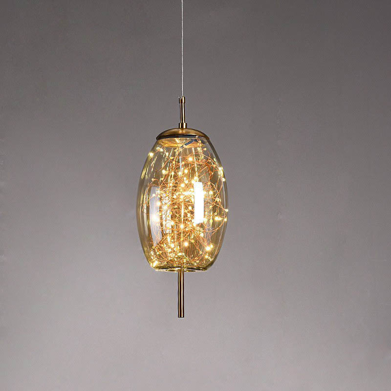 Contemporary Scandinavian Cylinder Oval Glass Pendant Light - 1-Light for Bedroom  

Elevate your bedroom decor with this stylish contemporary Scandinavian cylinder oval glass pendant light. Its sleek design and soft illumination create a cozy atmosphere,