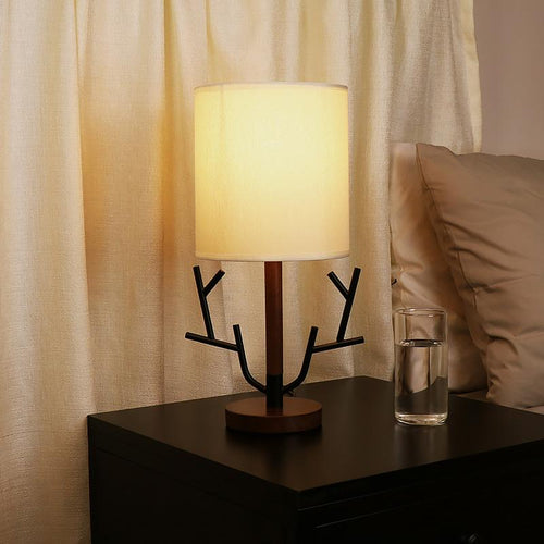 16 Inch Vintage Rustic Tree Branch Table Lamp with Fabric Drum Shade - US Plug

Enhance your home decor with this stunning 16-inch vintage rustic tree branch table lamp. Featuring a stylish fabric drum shade, this US plug lamp is perfect for adding a touc