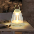Portable Battery Powered Outdoor Spiral LED Lamp - Stylish and Versatile Lighting Solution for Patios, Camping, and Garden Use.