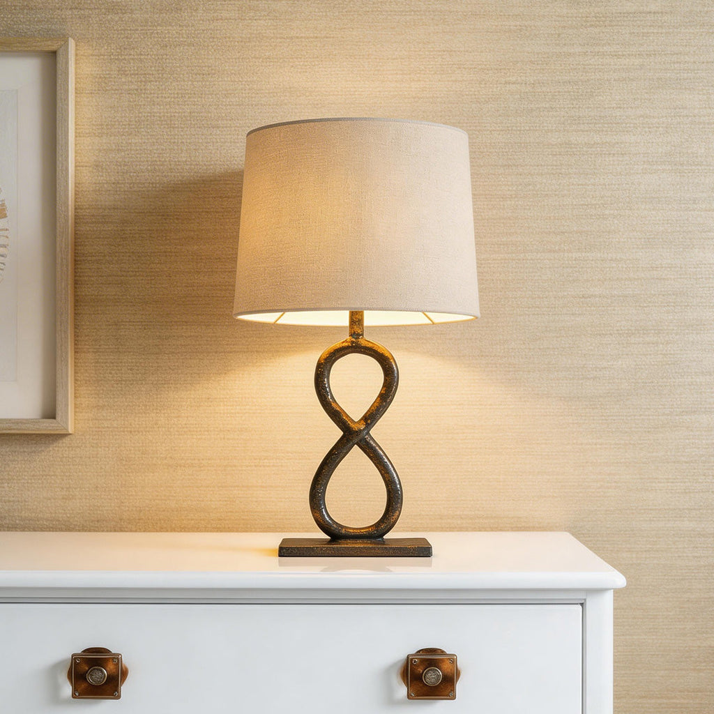 Bronze Metal Table Lamp - European Luxury Fabric Light

Enhance your home decor with this stunning bronze metal table lamp, featuring exquisite European luxury fabric. Perfect for living rooms, bedrooms, or office spaces, this elegant light fixture adds s