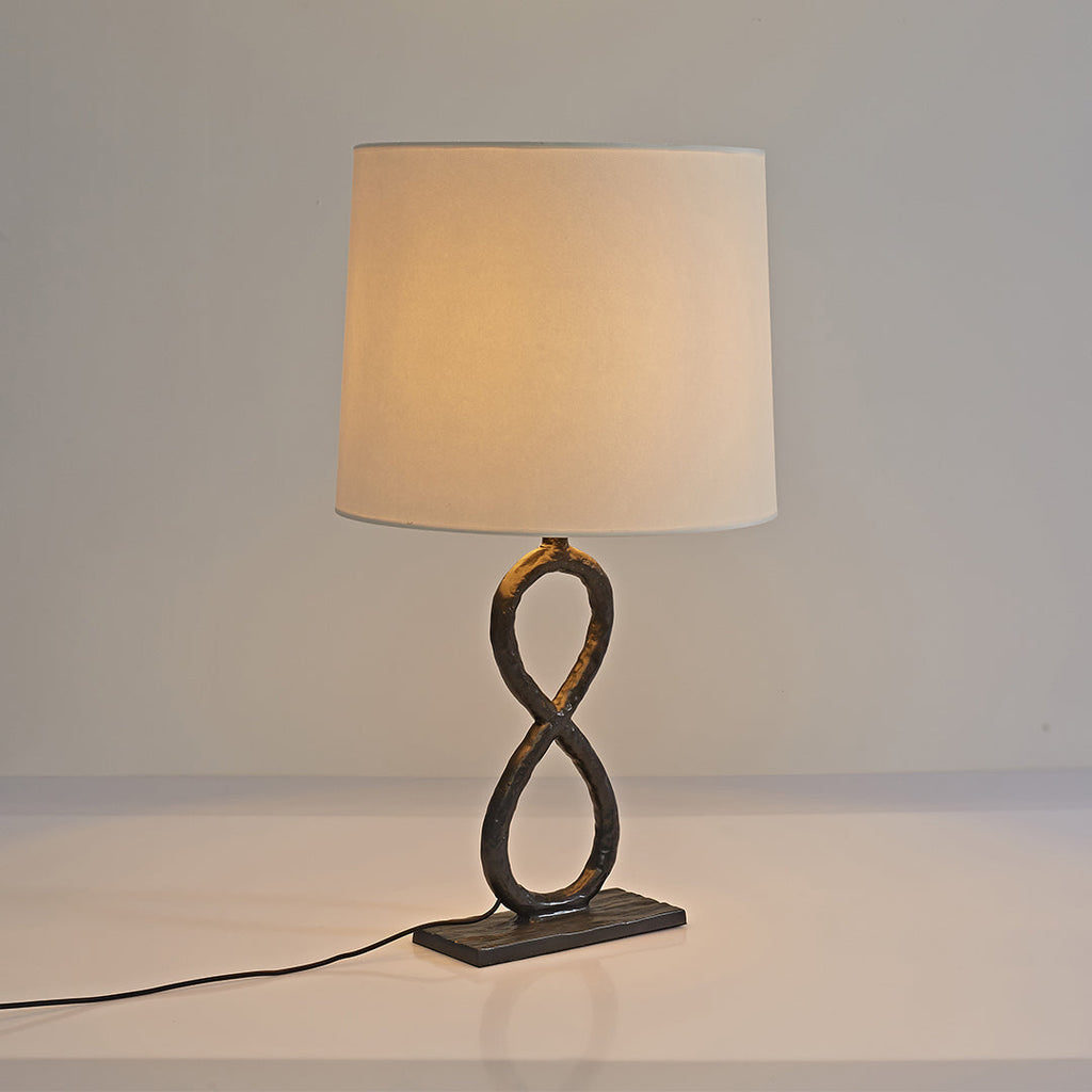 Bronze Metal Table Lamp - European Luxury Fabric Light

Enhance your home decor with this stunning bronze metal table lamp, featuring exquisite European luxury fabric. Perfect for living rooms, bedrooms, or office spaces, this elegant light fixture adds s