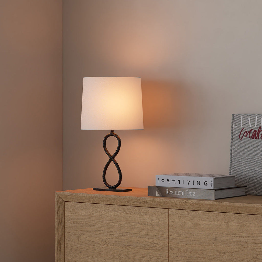 Bronze Metal Table Lamp - European Luxury Fabric Light

Enhance your home decor with this stunning bronze metal table lamp, featuring exquisite European luxury fabric. Perfect for living rooms, bedrooms, or office spaces, this elegant light fixture adds s