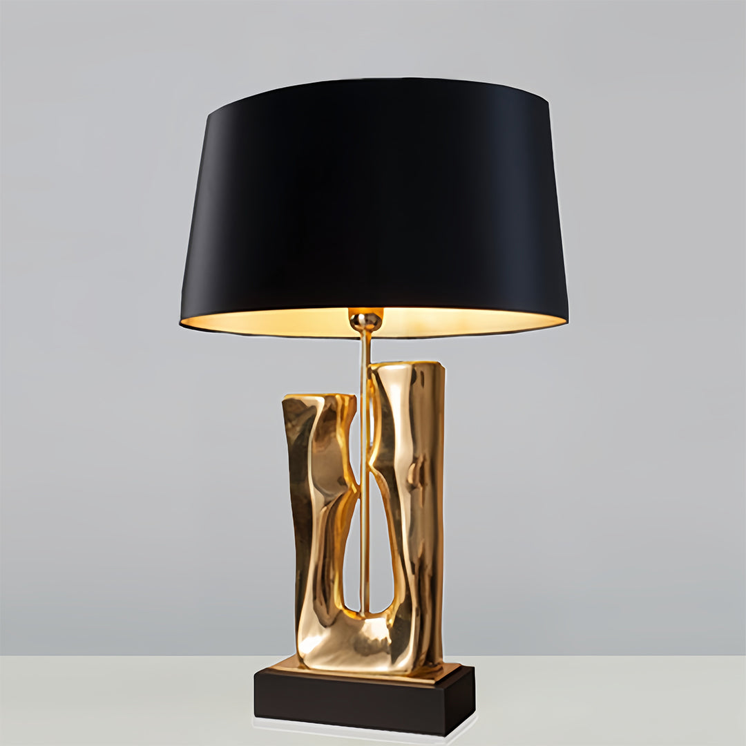 Gold and Black Sculptural Table Lamp with Elegant Drum Shade