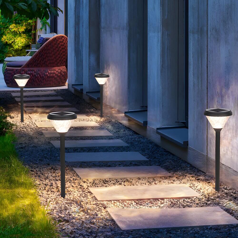 Elegant Black Solar LED Pathway Lights - 27.6 Inch Water Ripple Design

Illuminate your outdoor space with these stylish black solar LED pathway lights. Standing at 27.6 inches tall, they feature a stunning water ripple design that adds a touch of eleganc