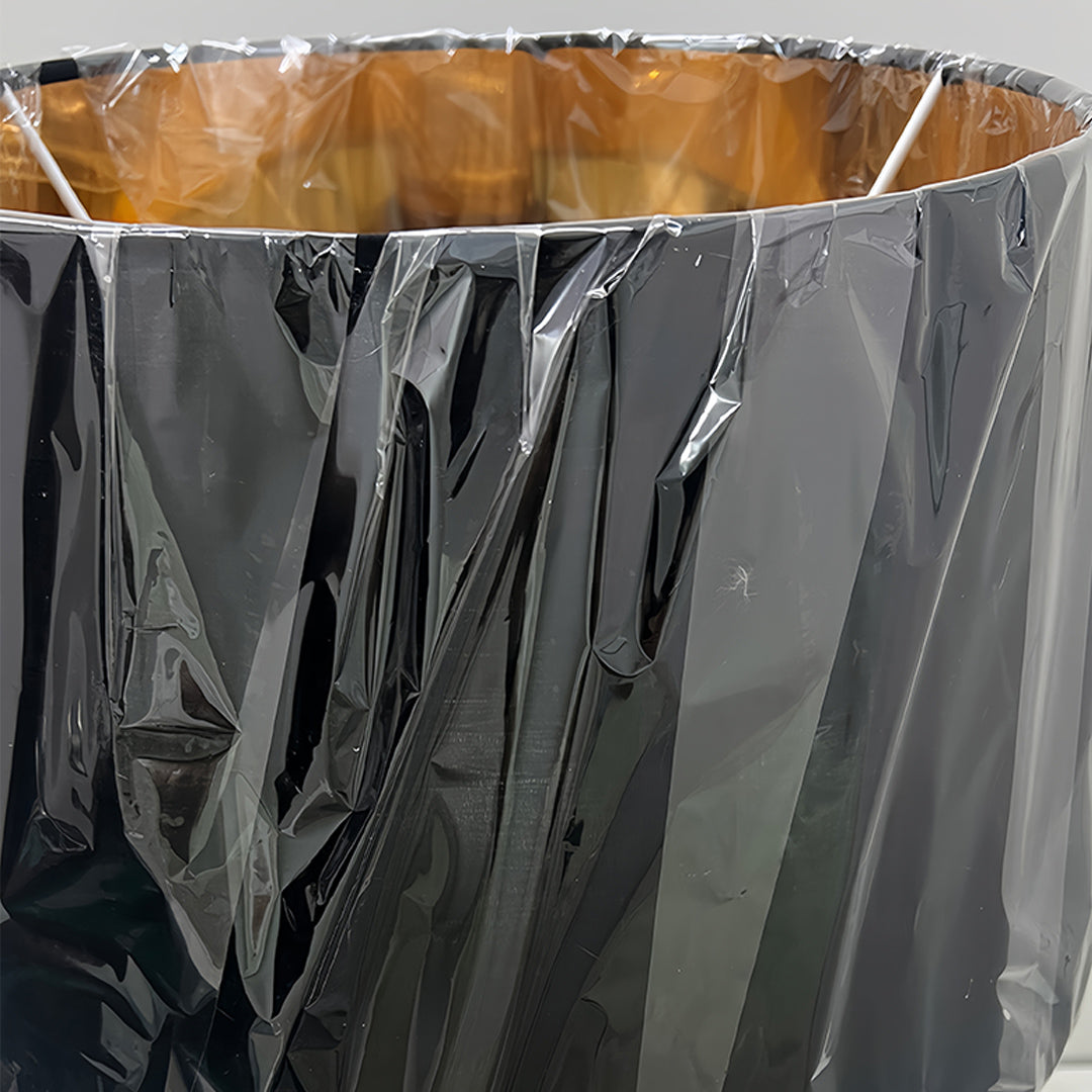 Gold and Black Sculptural Table Lamp with Elegant Drum Shade