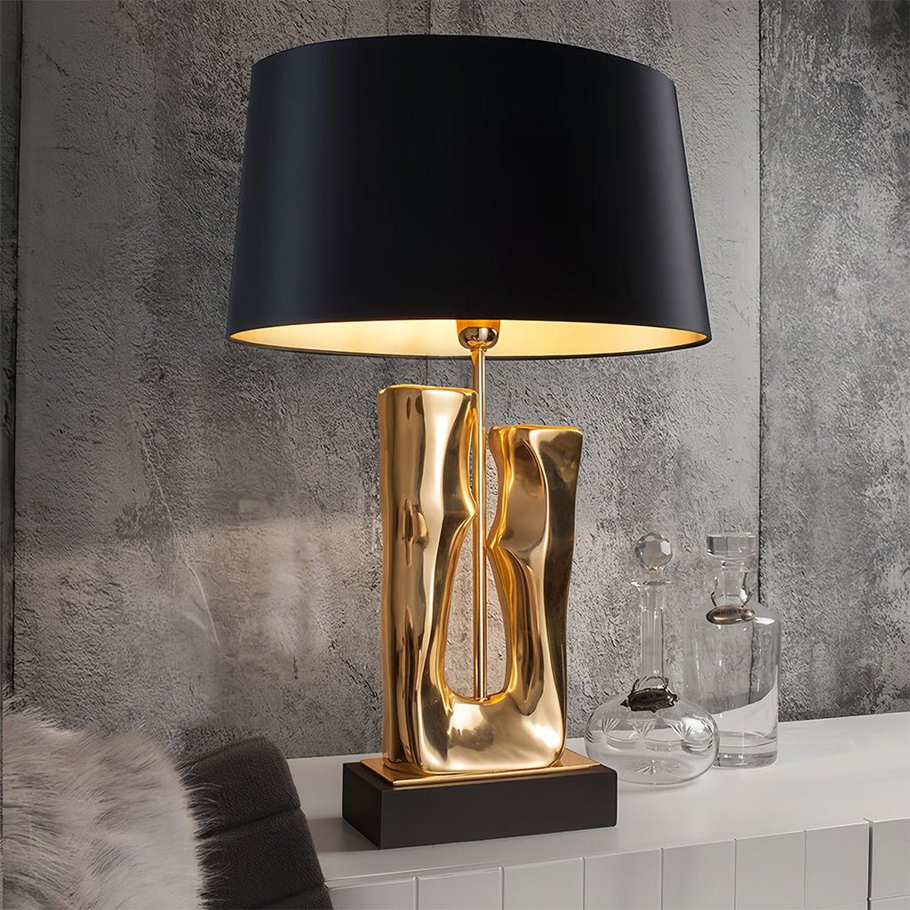 Gold and Black Sculptural Table Lamp with Elegant Drum Shade