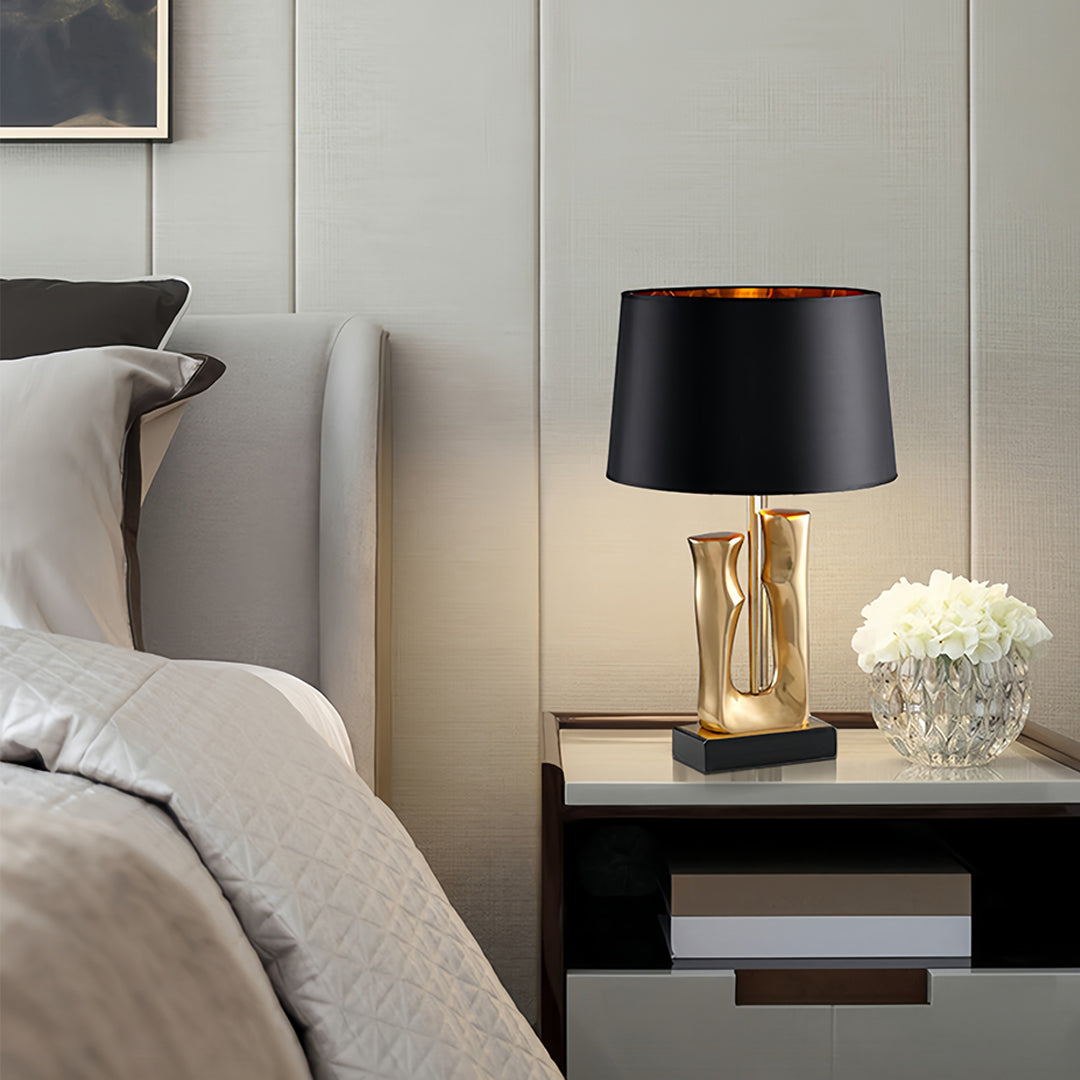 Gold and Black Sculptural Table Lamp with Elegant Drum Shade