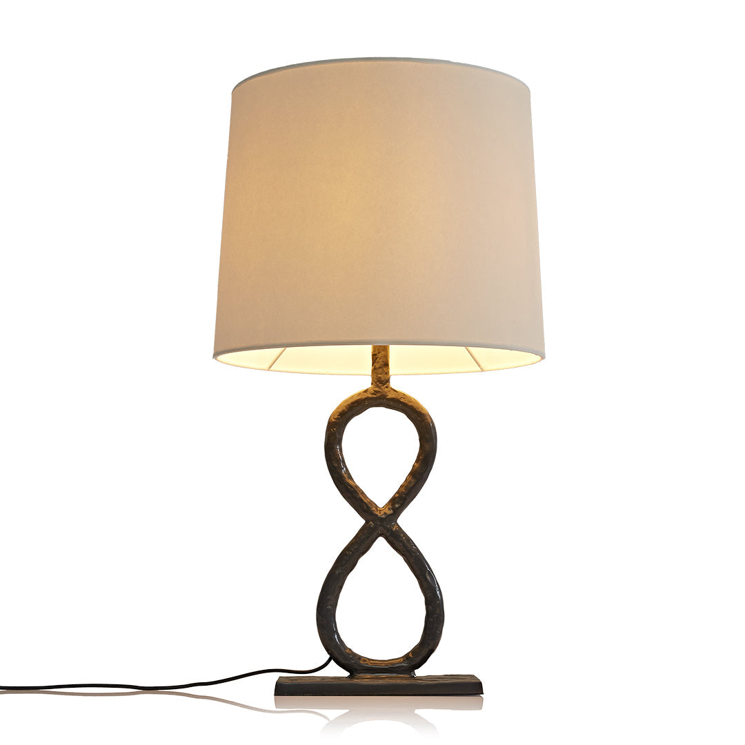Bronze Metal Table Lamp - European Luxury Fabric Light

Enhance your home decor with this stunning bronze metal table lamp, featuring exquisite European luxury fabric. Perfect for living rooms, bedrooms, or office spaces, this elegant light fixture adds s