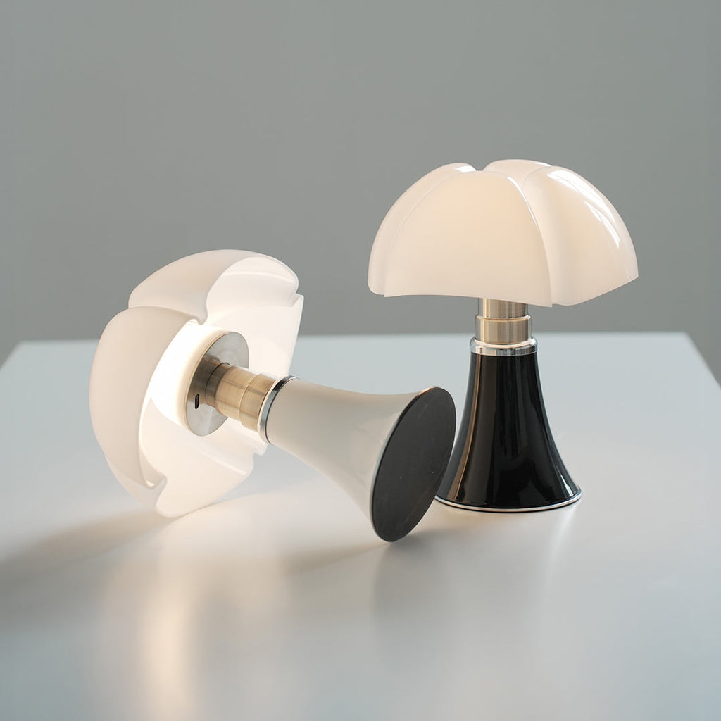 Bauhaus Style Iron Table Lamp - Italian Design Touch for Modern Interiors

This sleek Bauhaus-inspired table lamp showcases a fusion of functional design and Italian elegance. Crafted from durable iron, it features clean lines and a minimalist silhouette,