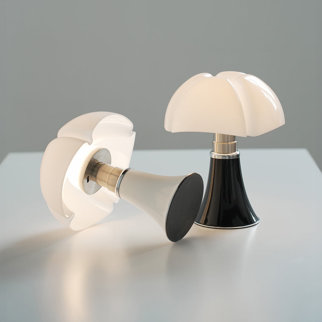 Bauhaus Style Iron Table Lamp - Italian Design Touch for Modern Interiors

This sleek Bauhaus-inspired table lamp showcases a fusion of functional design and Italian elegance. Crafted from durable iron, it features clean lines and a minimalist silhouette,