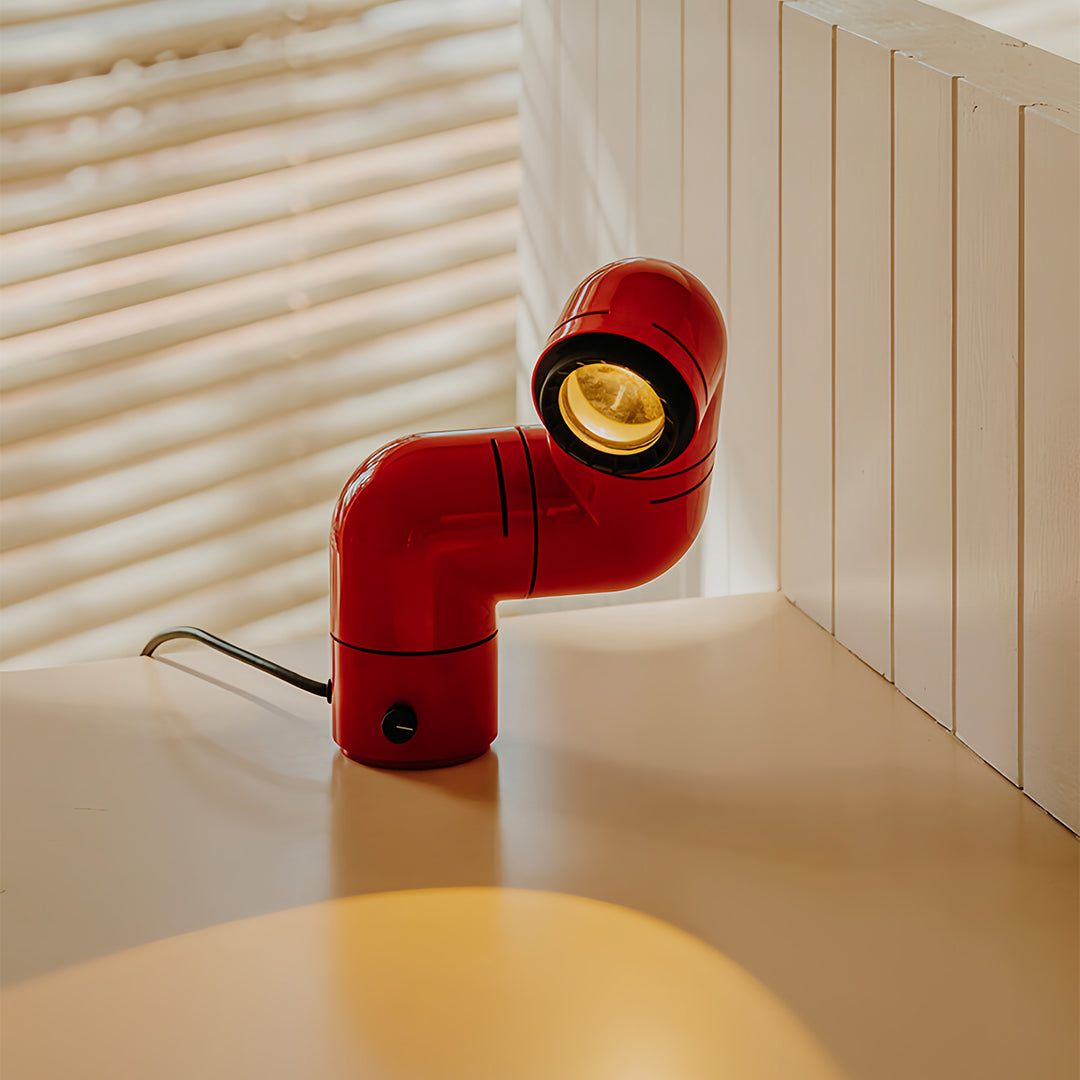 **Statement Table Lamp - Creative Pipe Modern Rotating Design**

**Product Description:**
Introducing our Statement Table Lamp, a unique blend of creativity and modern design. This eye-catching lamp features a striking pipe-inspired structure that not onl