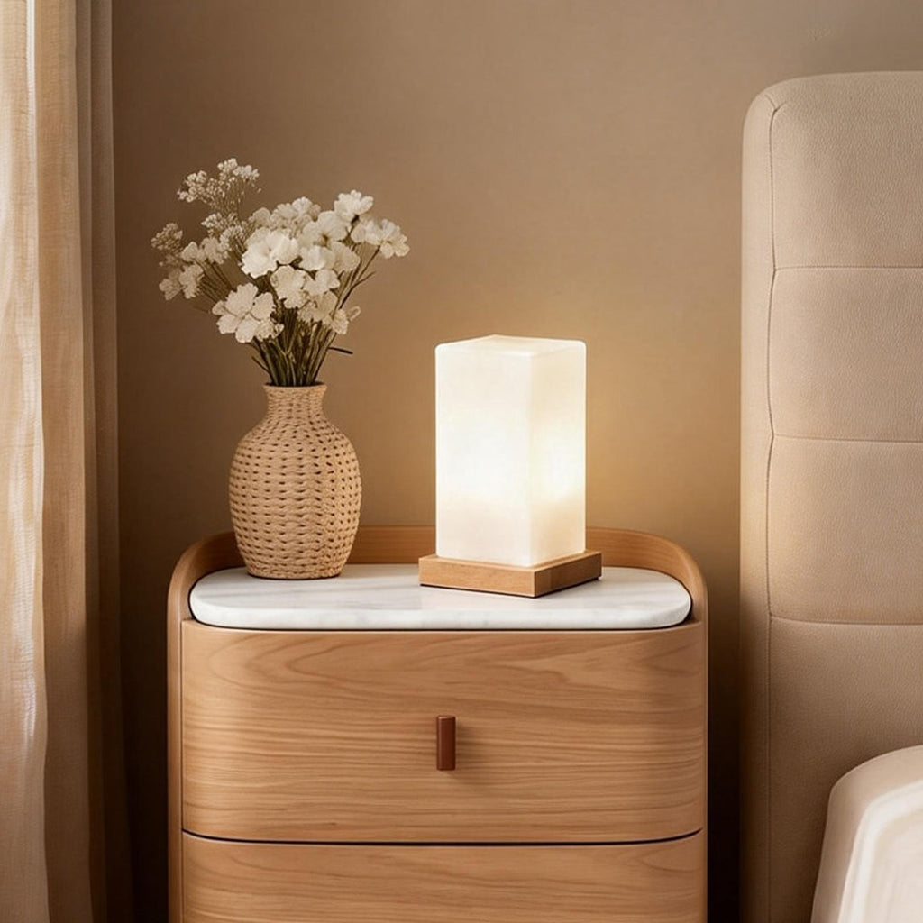 Title: Battery-Powered LED Wooden Cube Lamp

Description: Illuminate your space with our stylish Square Table Light. This Battery-Powered LED Wooden Cube Lamp combines modern design with warm ambiance, making it perfect for any room. Ideal for nightstands