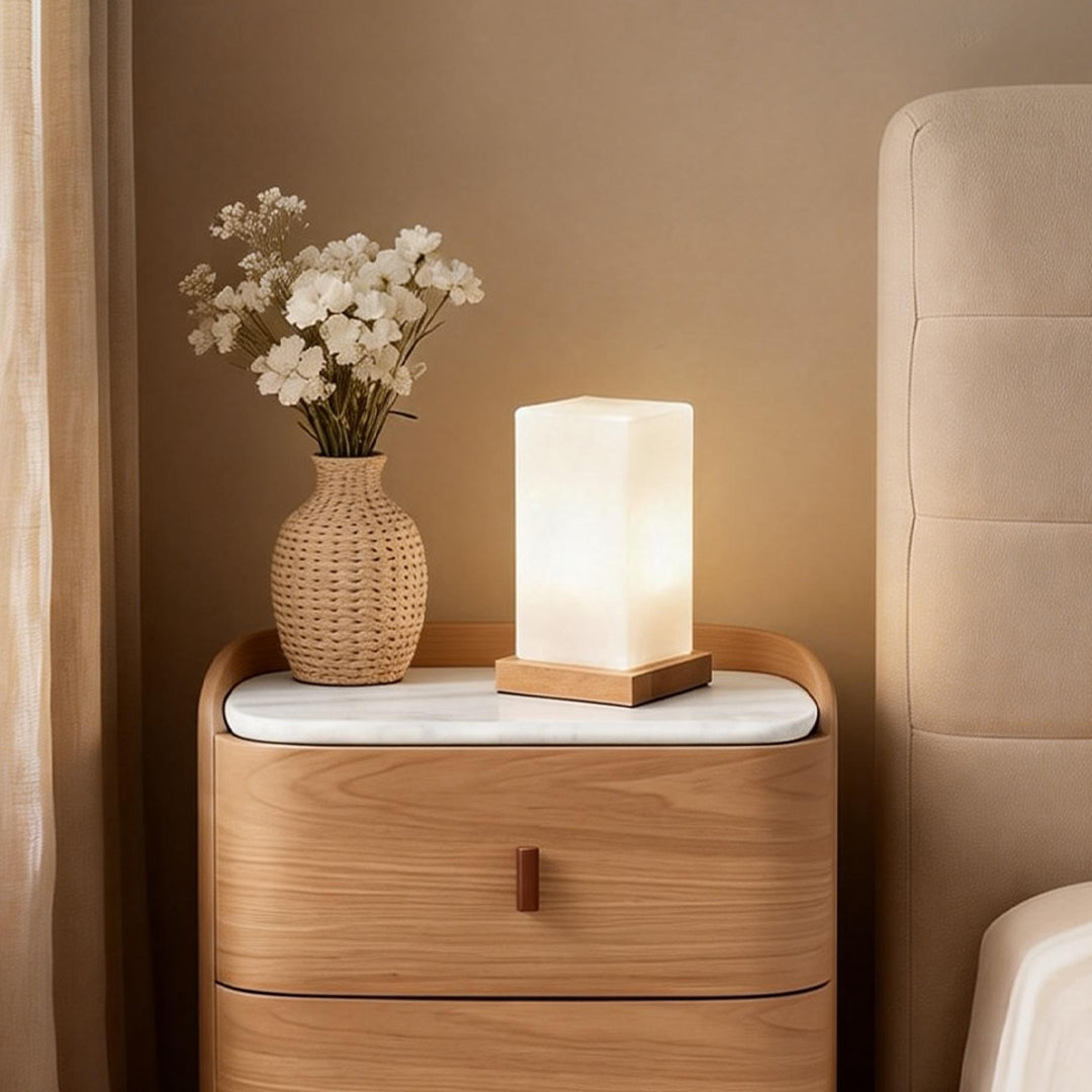 Title: Battery-Powered LED Wooden Cube Lamp

Description: Illuminate your space with our stylish Square Table Light. This Battery-Powered LED Wooden Cube Lamp combines modern design with warm ambiance, making it perfect for any room. Ideal for nightstands