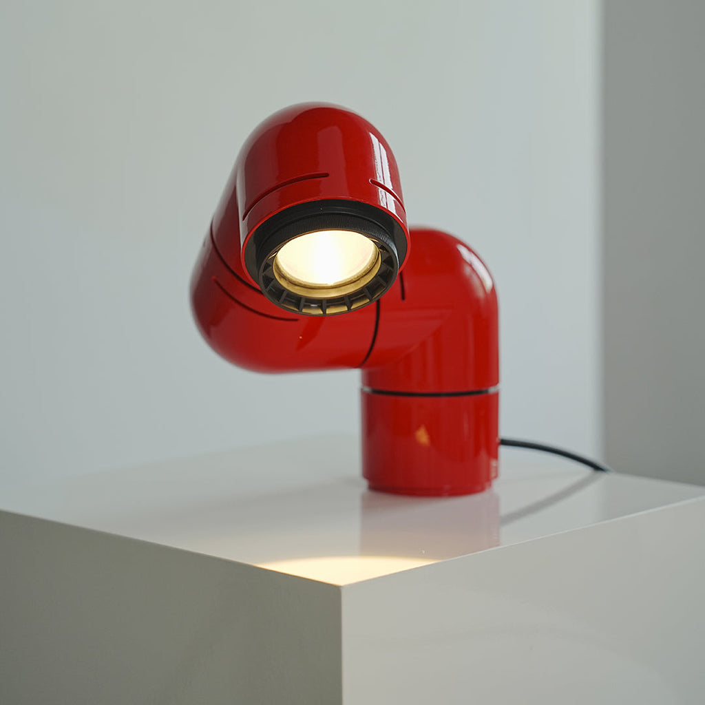 **Statement Table Lamp - Creative Pipe Modern Rotating Design**

**Product Description:**
Introducing our Statement Table Lamp, a unique blend of creativity and modern design. This eye-catching lamp features a striking pipe-inspired structure that not onl