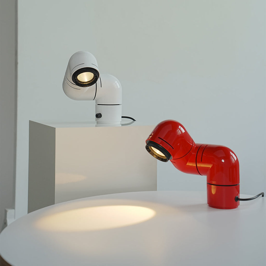 **Statement Table Lamp - Creative Pipe Modern Rotating Design**

**Product Description:**
Introducing our Statement Table Lamp, a unique blend of creativity and modern design. This eye-catching lamp features a striking pipe-inspired structure that not onl