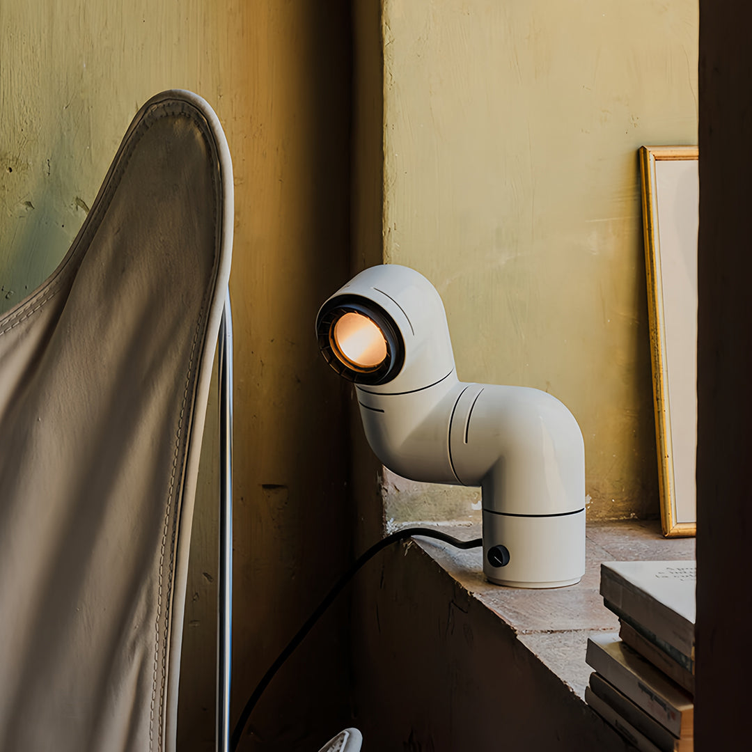 **Statement Table Lamp - Creative Pipe Modern Rotating Design**

**Product Description:**
Introducing our Statement Table Lamp, a unique blend of creativity and modern design. This eye-catching lamp features a striking pipe-inspired structure that not onl