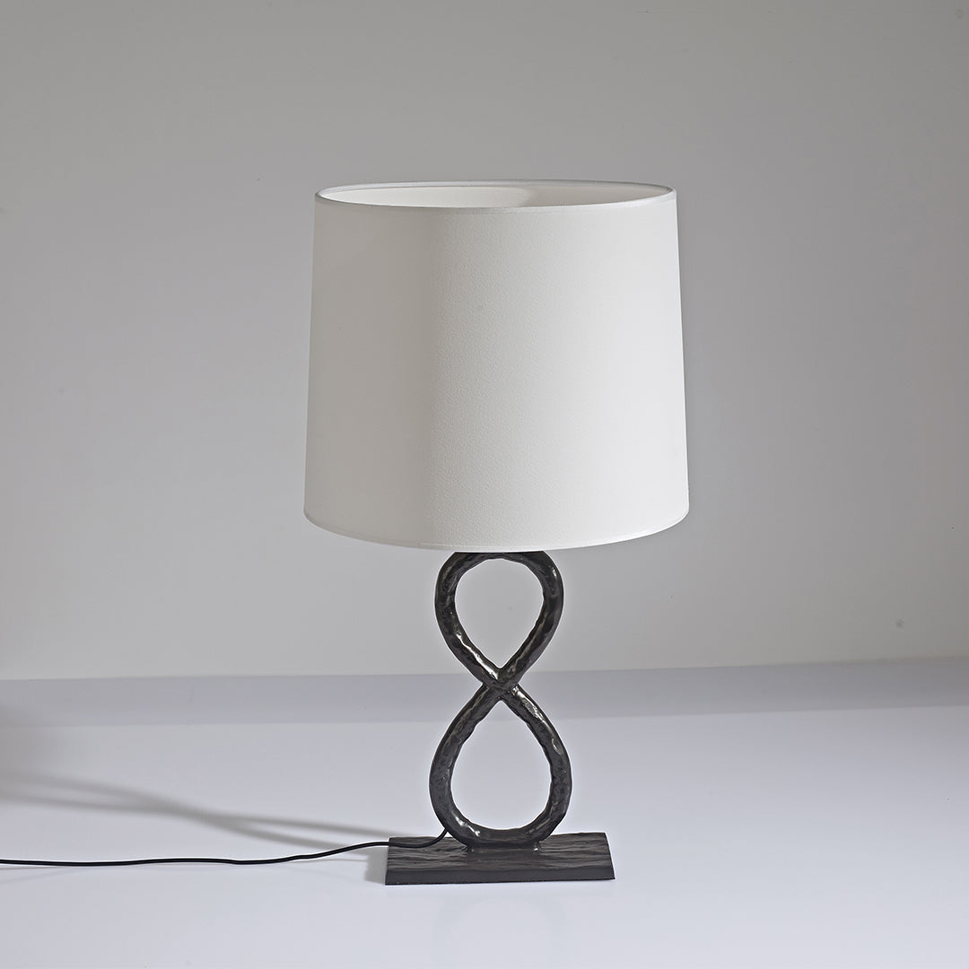 Bronze Metal Table Lamp - European Luxury Fabric Light

Enhance your home decor with this stunning bronze metal table lamp, featuring exquisite European luxury fabric. Perfect for living rooms, bedrooms, or office spaces, this elegant light fixture adds s