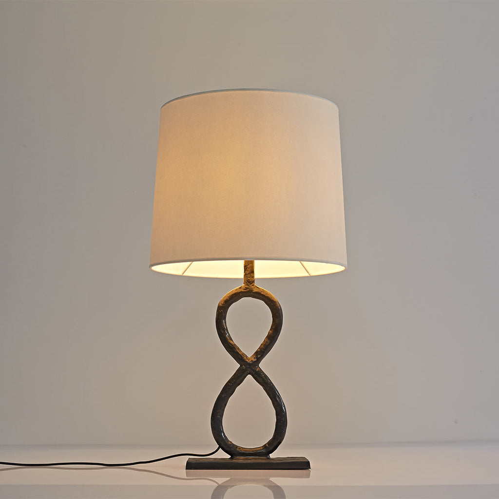Bronze Metal Table Lamp - European Luxury Fabric Light

Enhance your home decor with this stunning bronze metal table lamp, featuring exquisite European luxury fabric. Perfect for living rooms, bedrooms, or office spaces, this elegant light fixture adds s